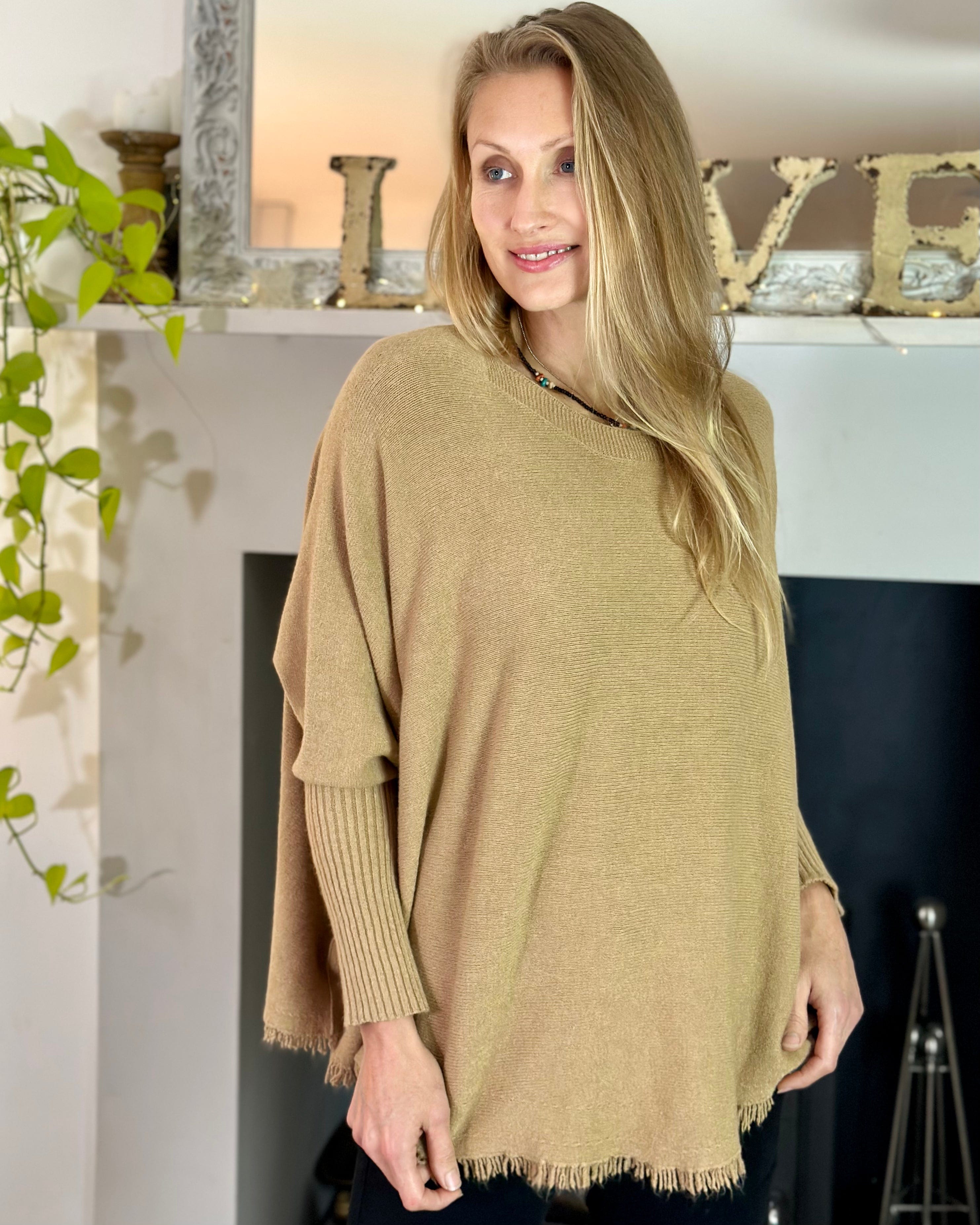 Poncho 2024 jumper uk